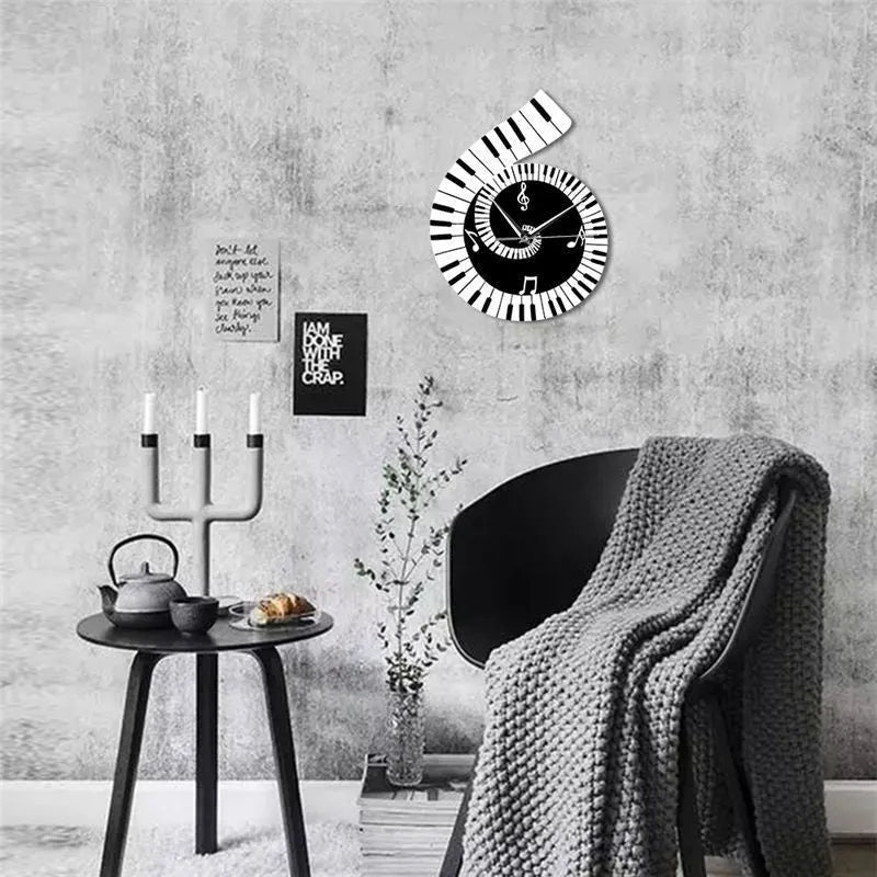 Black and white wall clock shaped with treble clef piano keyboard musical notes decoration