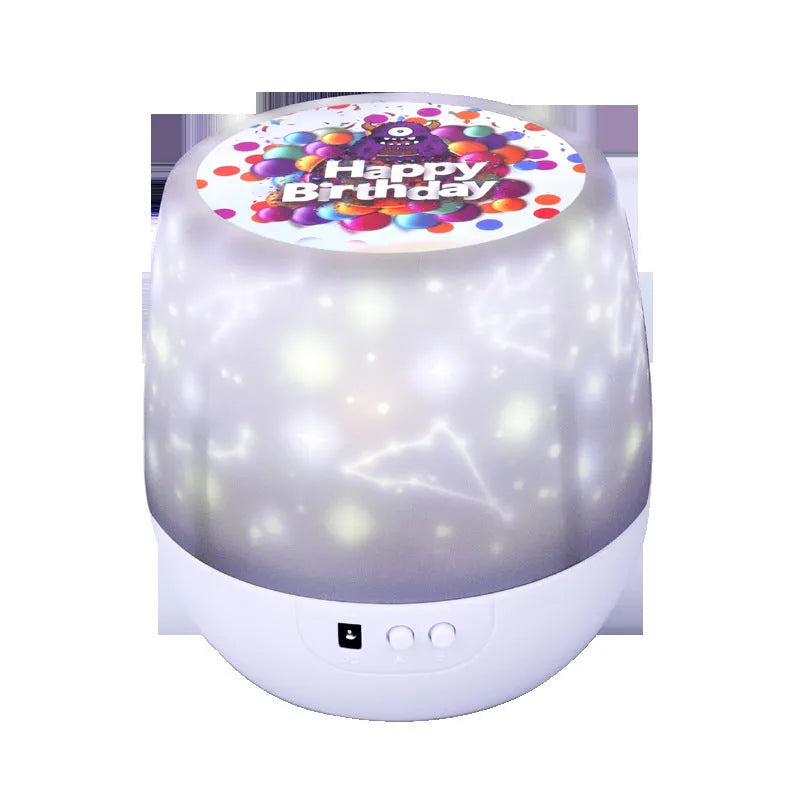 Starry sky projector lamp showing cosmic projection on wall with Bluetooth speaker and USB port