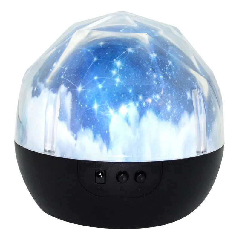 Starry sky projector lamp showing cosmic projection on wall with Bluetooth speaker and USB port