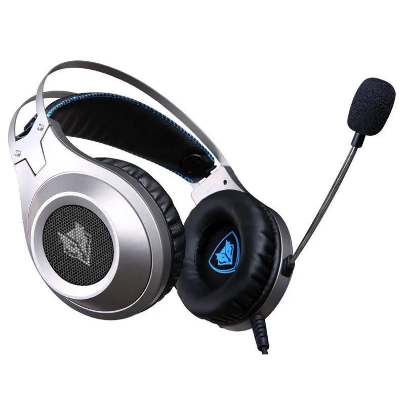 Black over-ear USB wired computer headset with microphone on a PC desktop