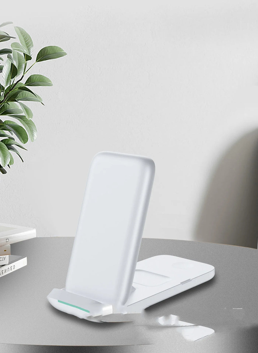 Black foldable three-in-one wireless charger with phone, watch and earbuds charging simultaneously