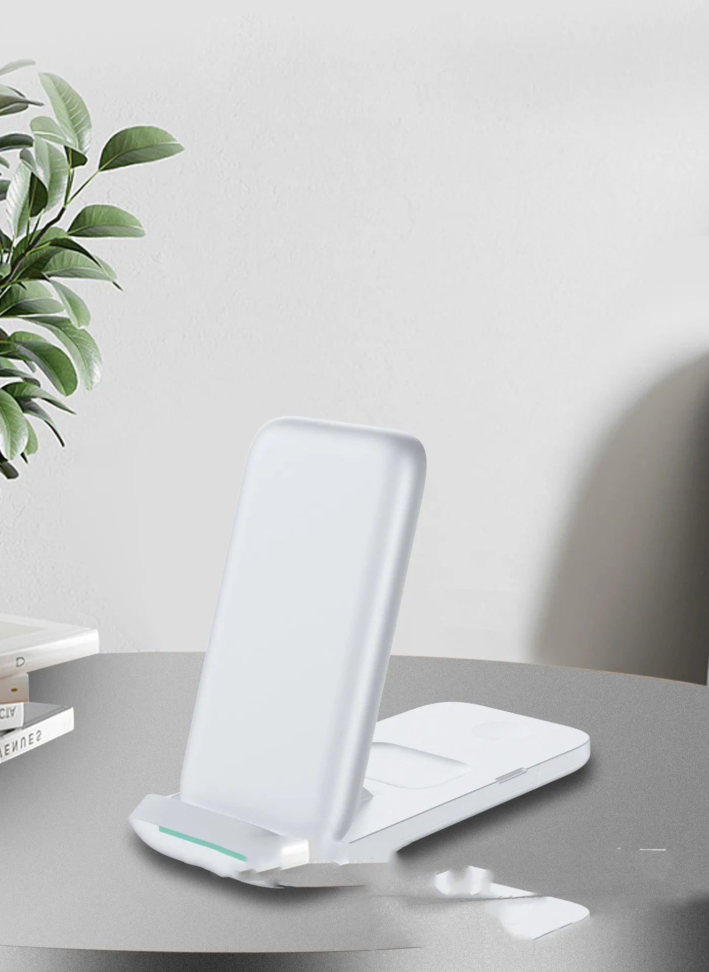 Black foldable three-in-one wireless charger with phone, watch and earbuds charging simultaneously
