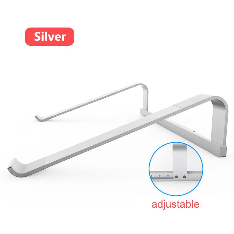 Aluminium alloy laptop air stand in silver hollowed out design supporting a notebook computer