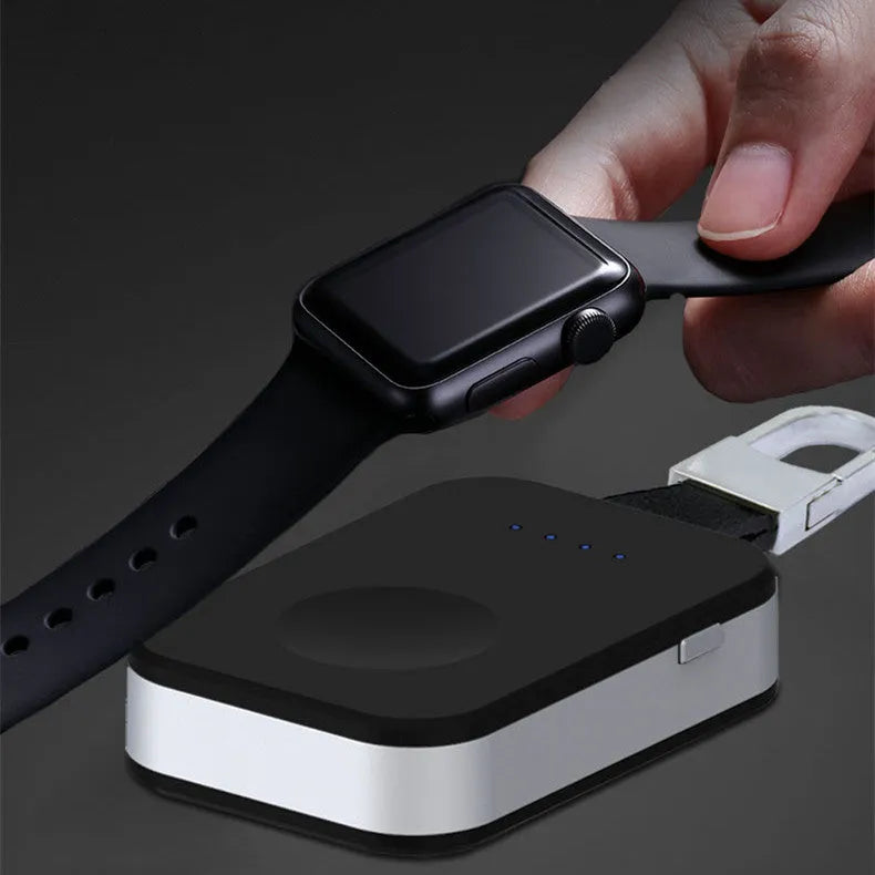 Black Apple Watch wireless charging power bank on a keyring