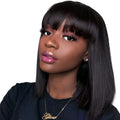 Black human hair wig with 10-inch length showing machine-made construction and natural hair texture