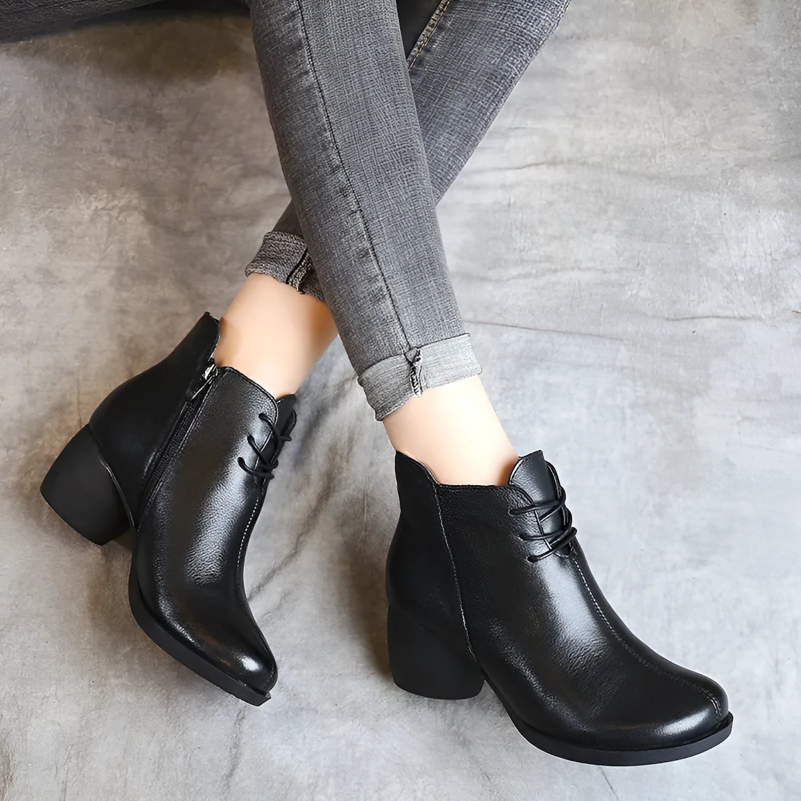 Women's brown retro leather Martin boots with a thick mid heel and round toe.