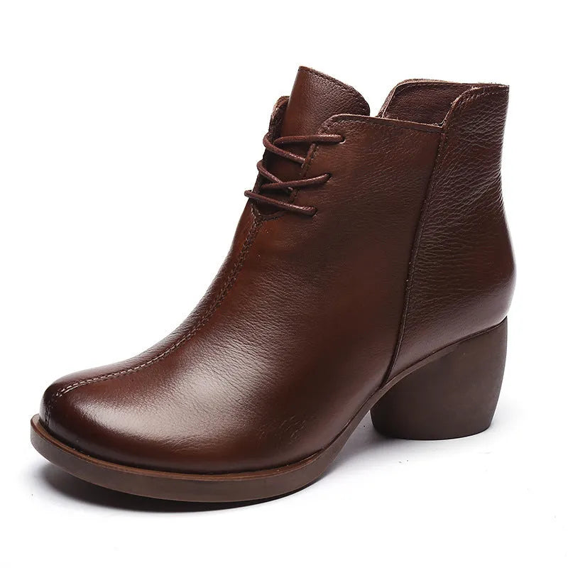 Women's brown retro leather Martin boots with a thick mid heel and round toe.