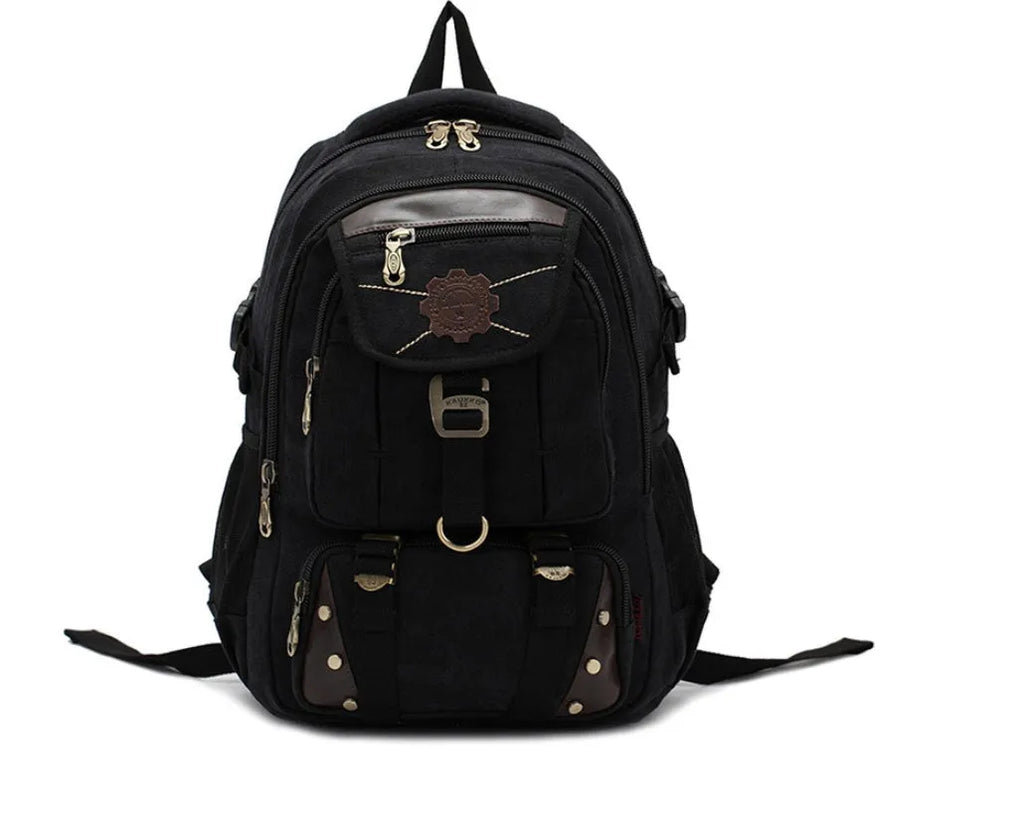 Canvas computer backpack in black with square vertical shape, zip closure, and multiple pockets