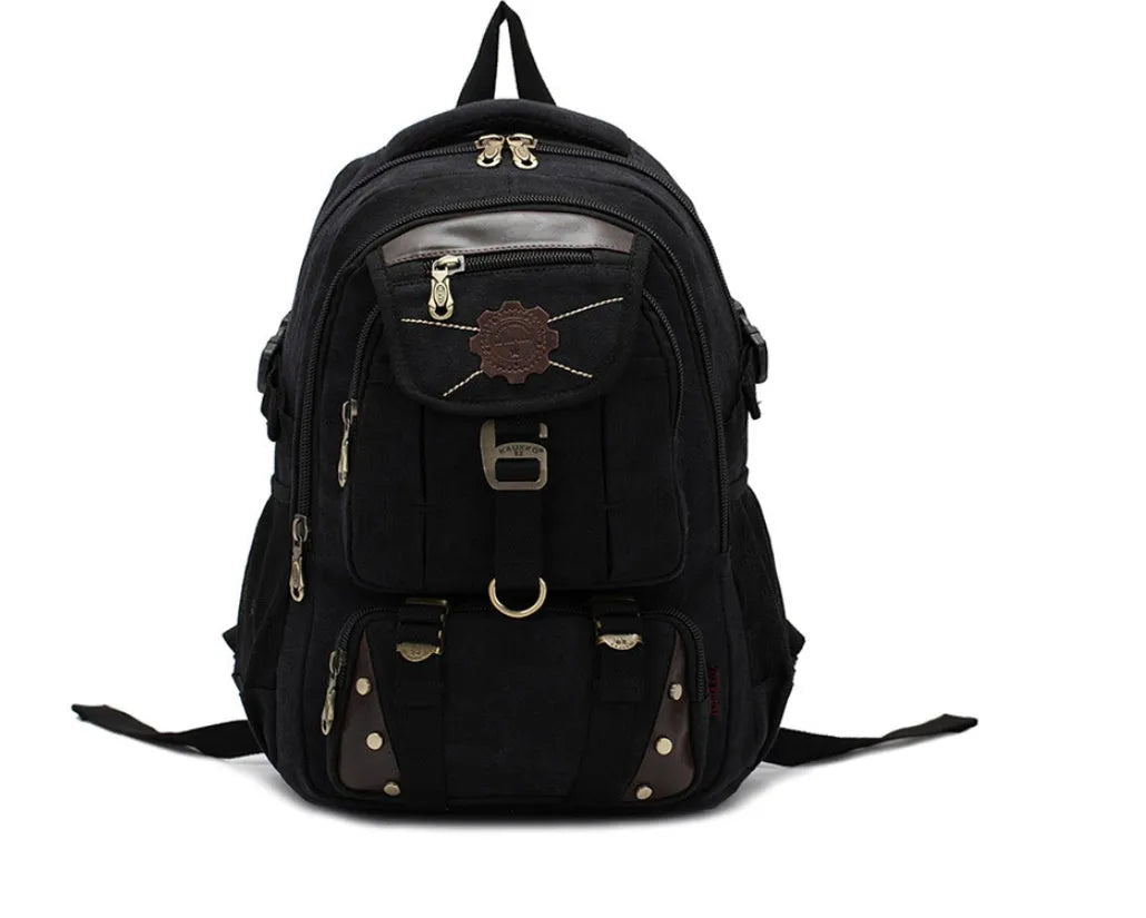 Canvas computer backpack in black with square vertical shape, zip closure, and multiple pockets