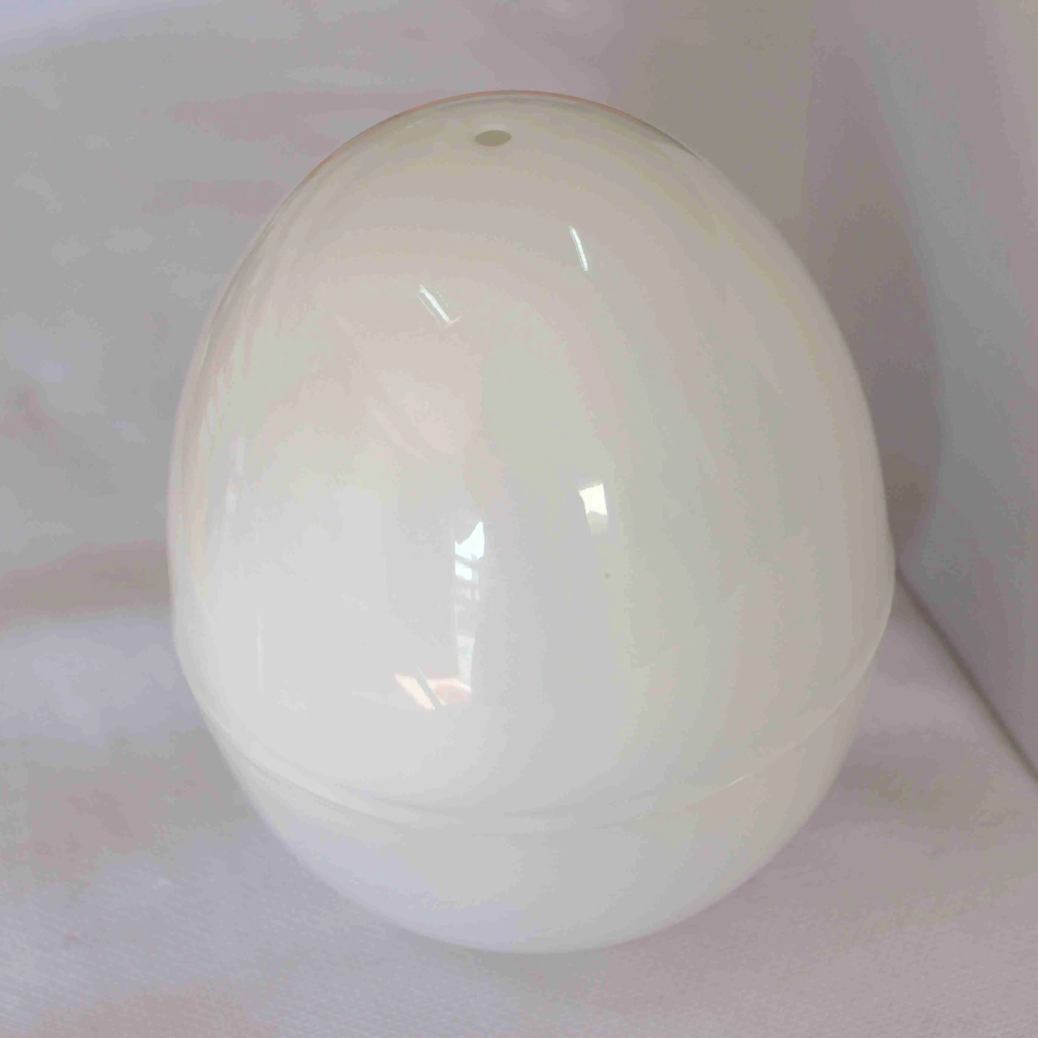 White microwave egg steamer for 4 eggs with vent hole and secure knob