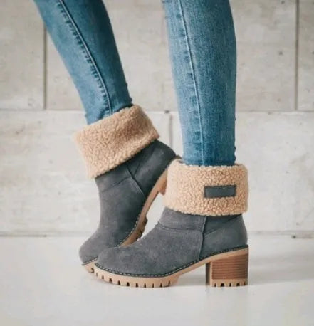 Women's mid-calf suede snow boots with a low flat heel and round toe, shown in available colours.