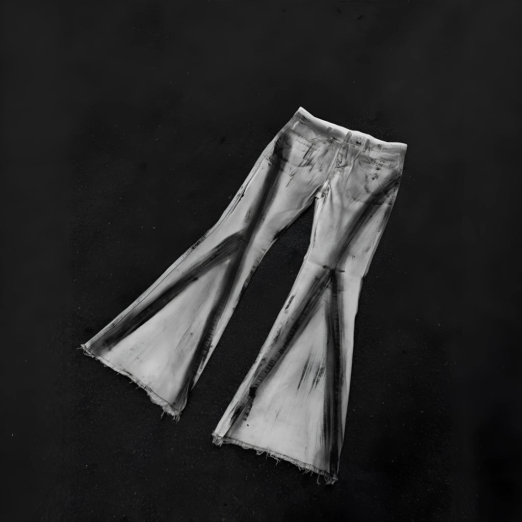 White retro heavy selvedge jeans with a black ribbon gradient wash and zip fly.