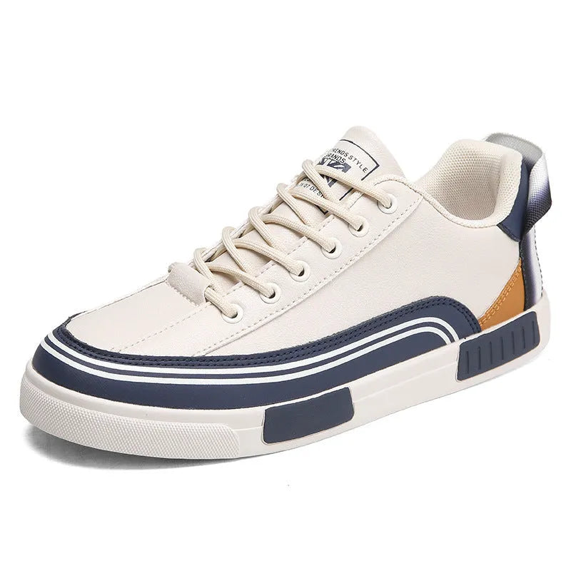 Men's white and green canvas casual shoes with mesh ventilation panels on the upper.