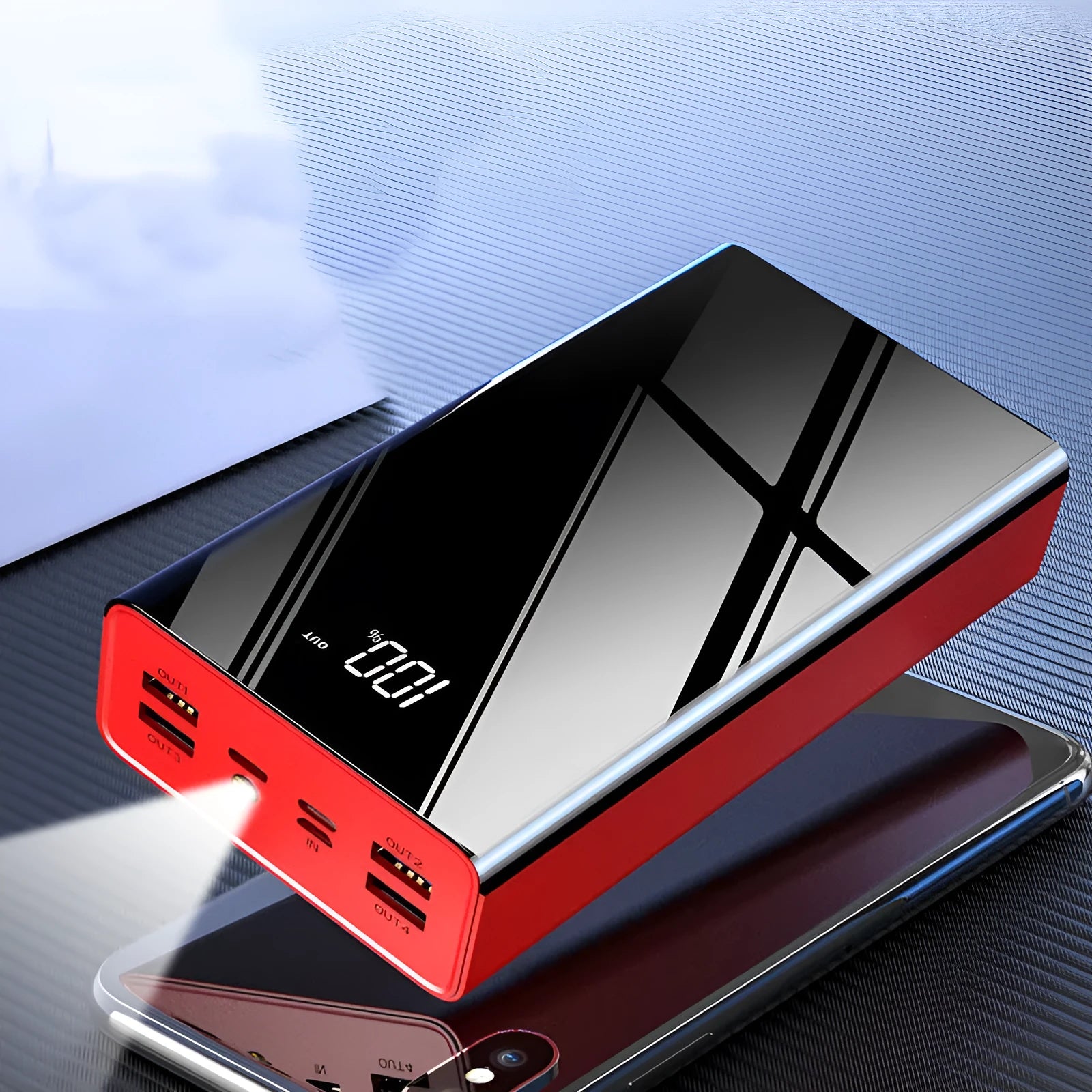 Large black or red 40000mAh power bank with LCD digital display showing battery level.