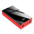 Large black or red 40000mAh power bank with LCD digital display showing battery level.