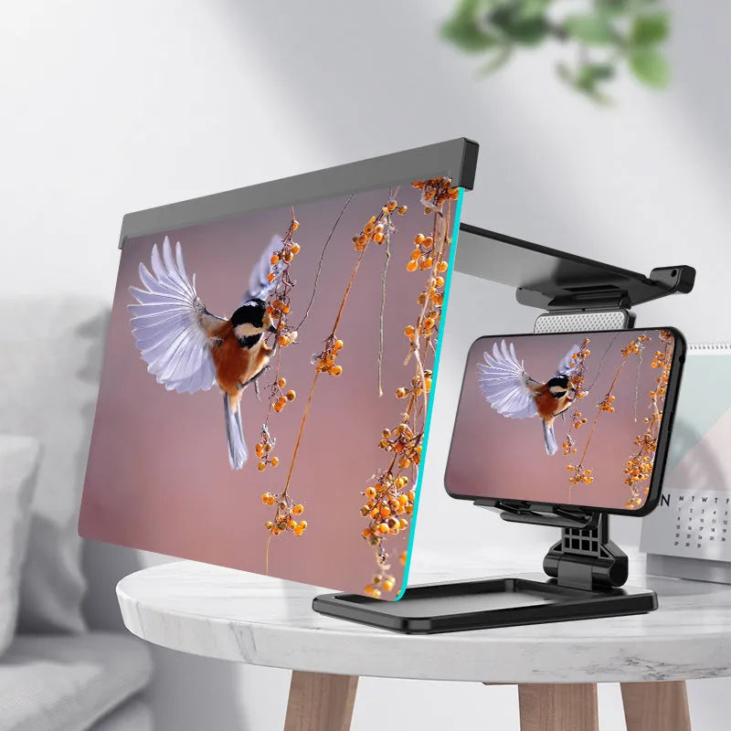 Black folding mobile phone screen amplifier with detachable holder showing 3-4x magnification