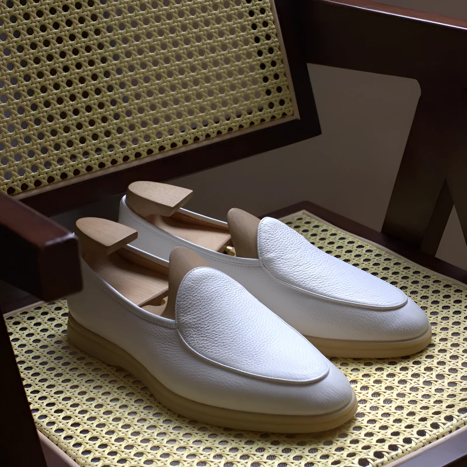 British handmade brown leather loafers for men on a white background