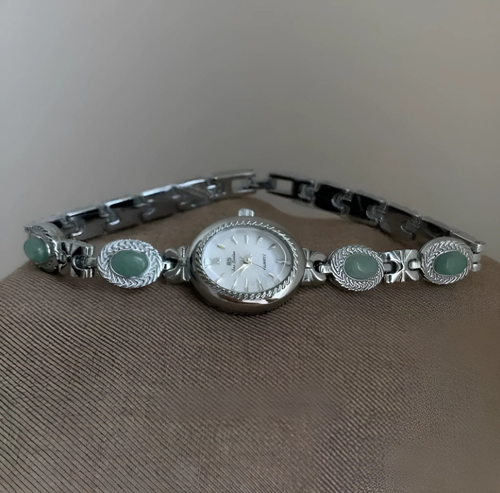 Ladies quartz watch with green jade silver finish and white dial face