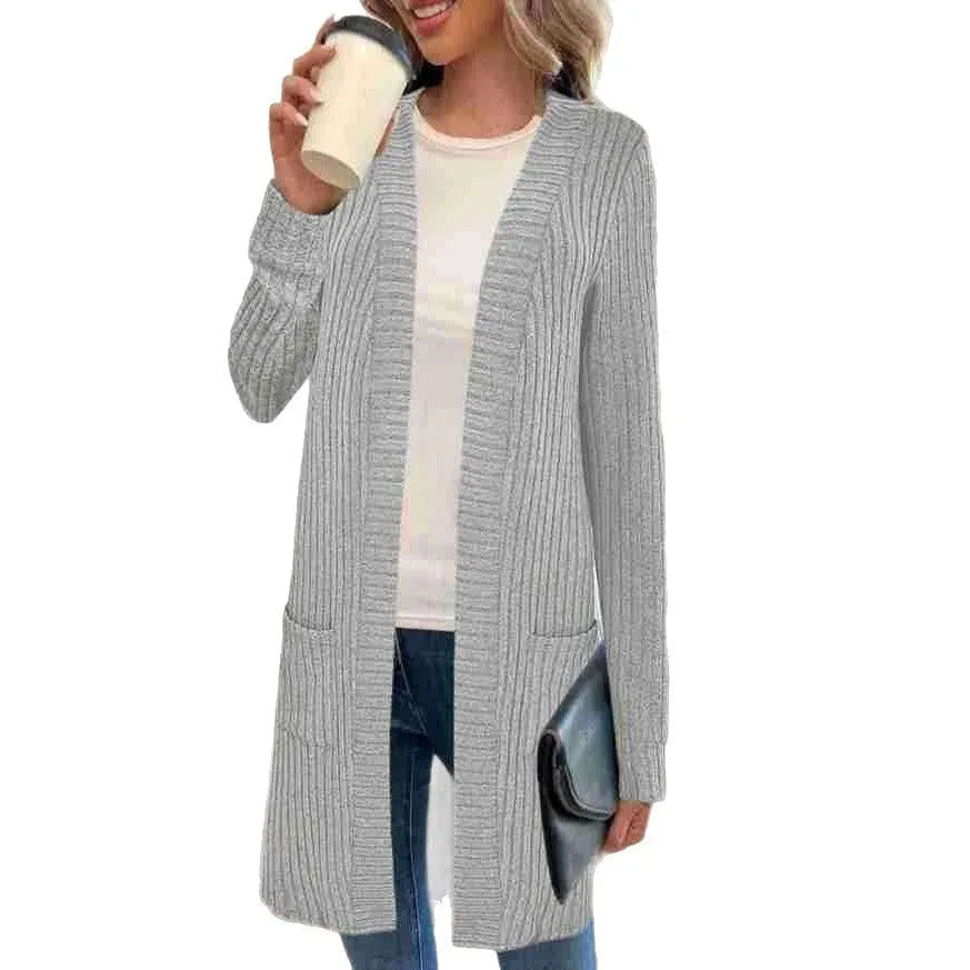 Loose long sleeve knitted cardigan jacket in black with side pockets.