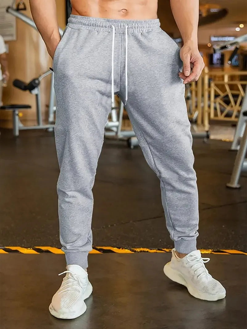Men's loose-fitting linen-style leisure trousers with elastic drawstring waist in various sizes