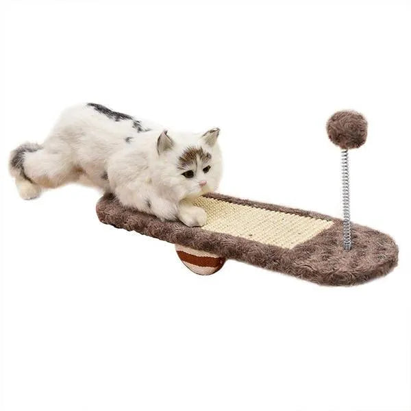 Royal blue cat seesaw toy with scratch board surface on a light background