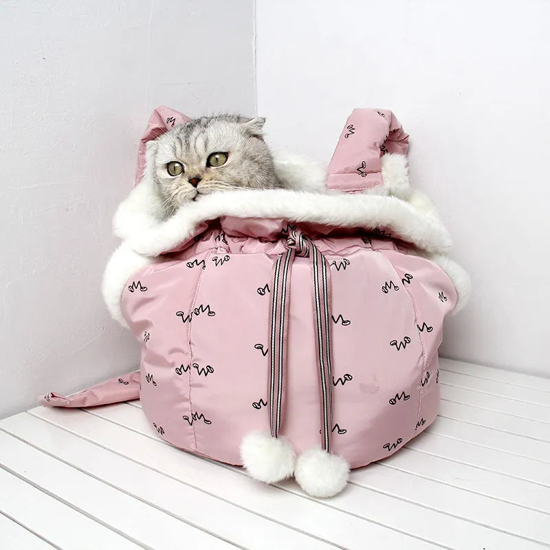 Winter pet carrier backpack in blue and pink made of soft flannel for cats and dogs