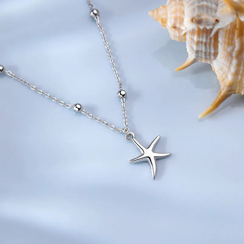 S925 sterling silver anklet with starfish charm and round beads on adjustable chain