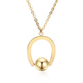 Gold or silver electroplated stainless steel geometric pendant necklace on a cross chain.