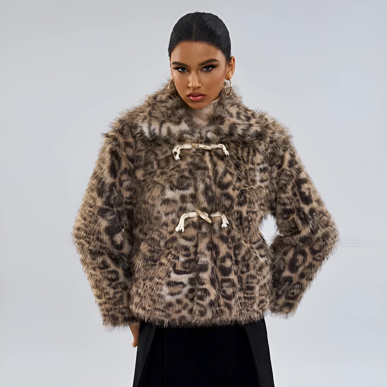 Women's leopard print street fashion coat with regular sleeves on a hanger.