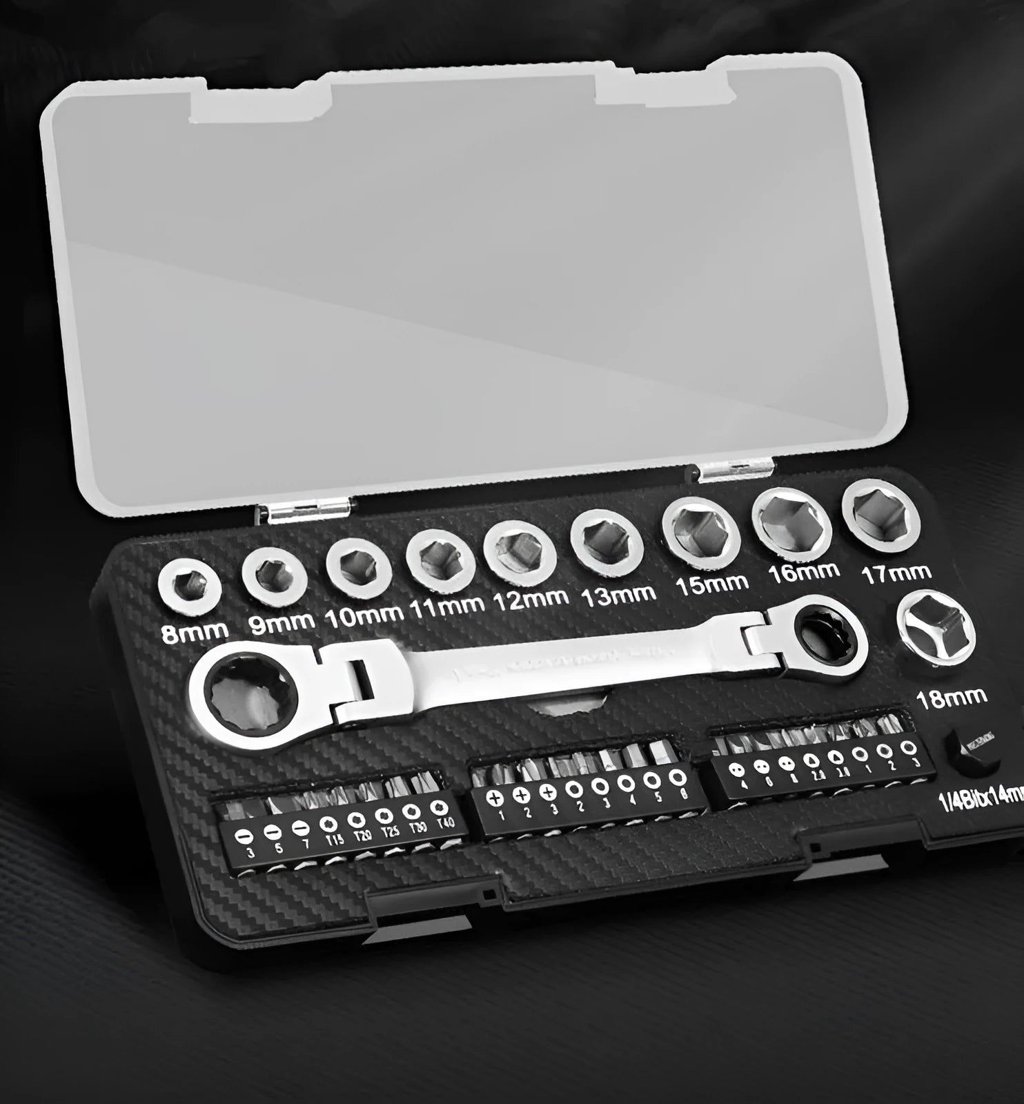 Dual-purpose ratchet wrench set with ten sockets and three bit heads laid out on a work surface.