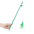 Green interactive cat feather wand toy with bells and feathers on a durable string