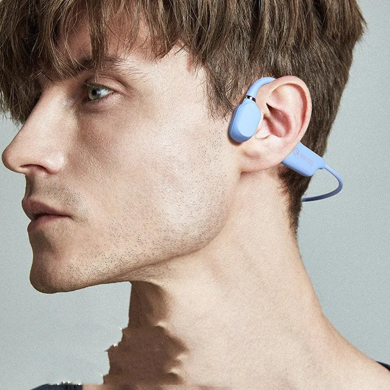 Wireless bone conduction Bluetooth sports headset in hanging neck design on a person running.