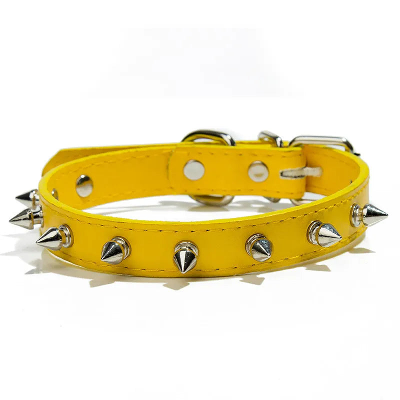 A studded dog collar made of black PU leather with silver metal studs and an alloy buckle fastener.