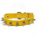 A studded dog collar made of black PU leather with silver metal studs and an alloy buckle fastener.