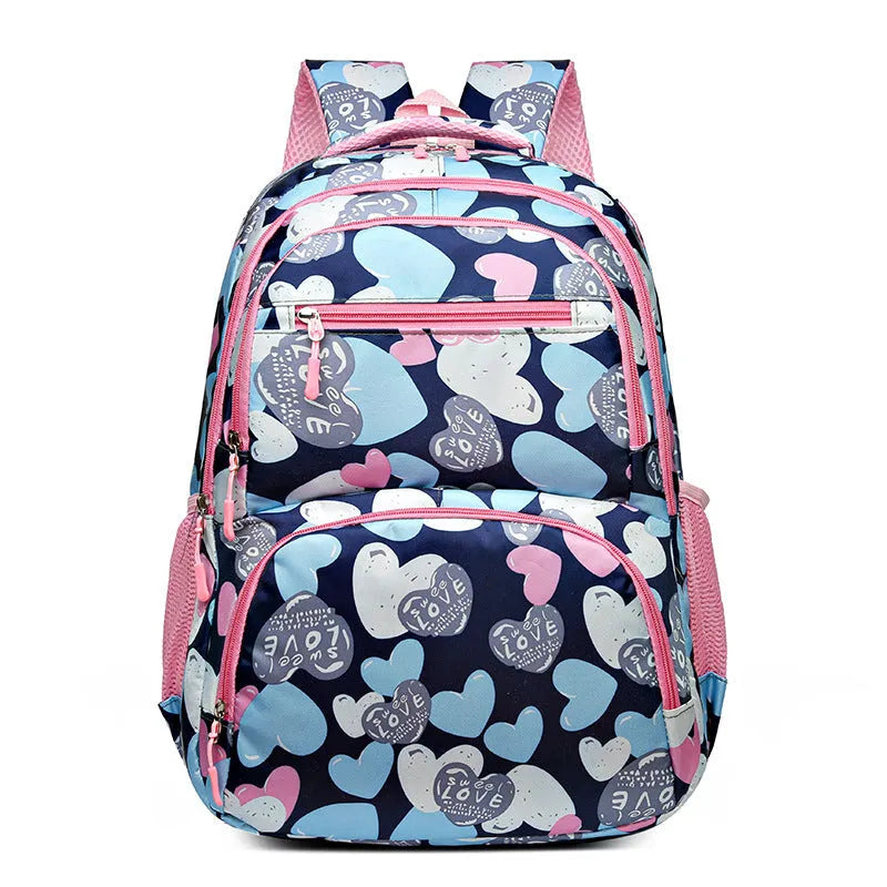 Blue Oxford cloth student backpack with air pillow shoulder straps shown open