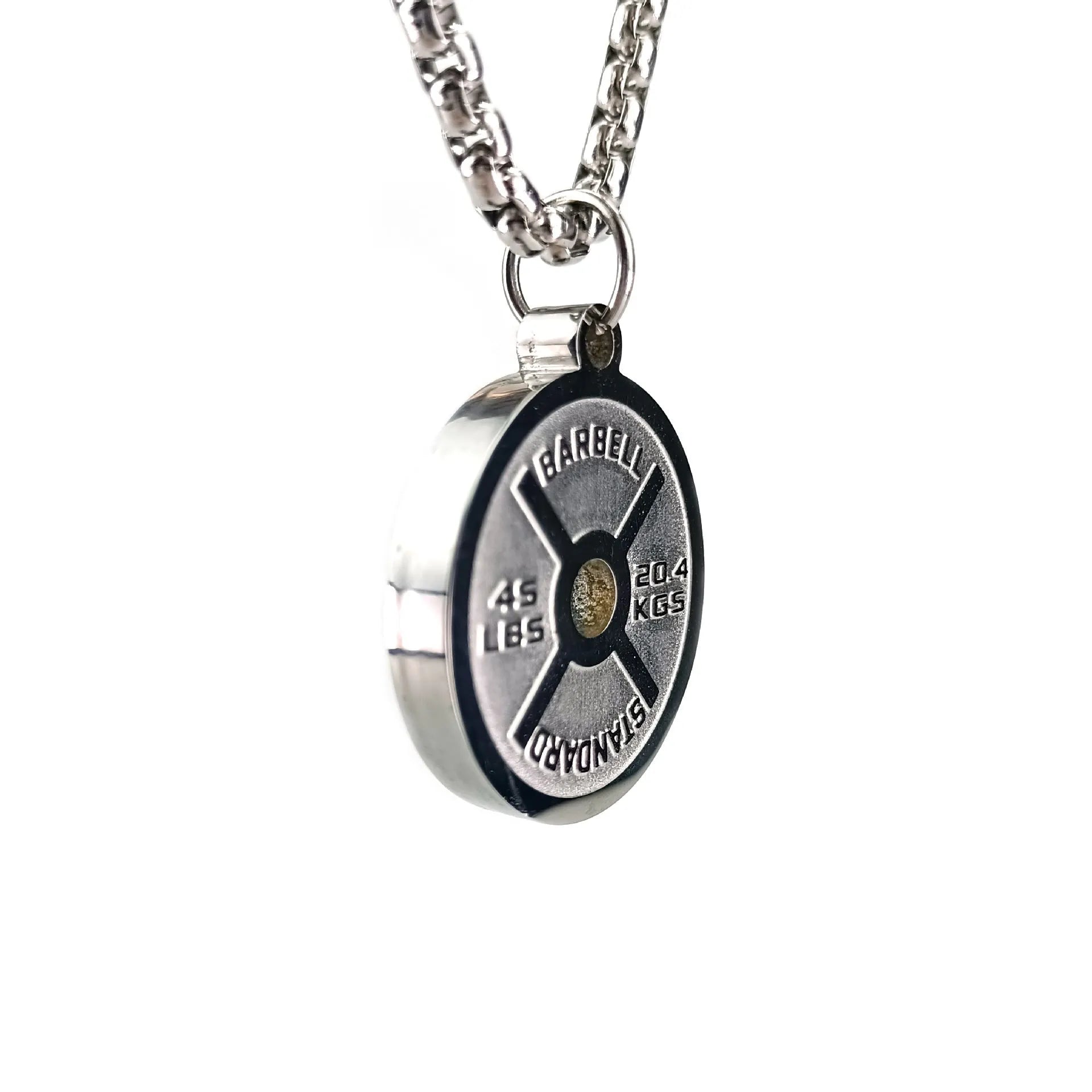 Polished stainless steel barbell disk pendant on a 60cm chain, a fitness-inspired geometric necklace.