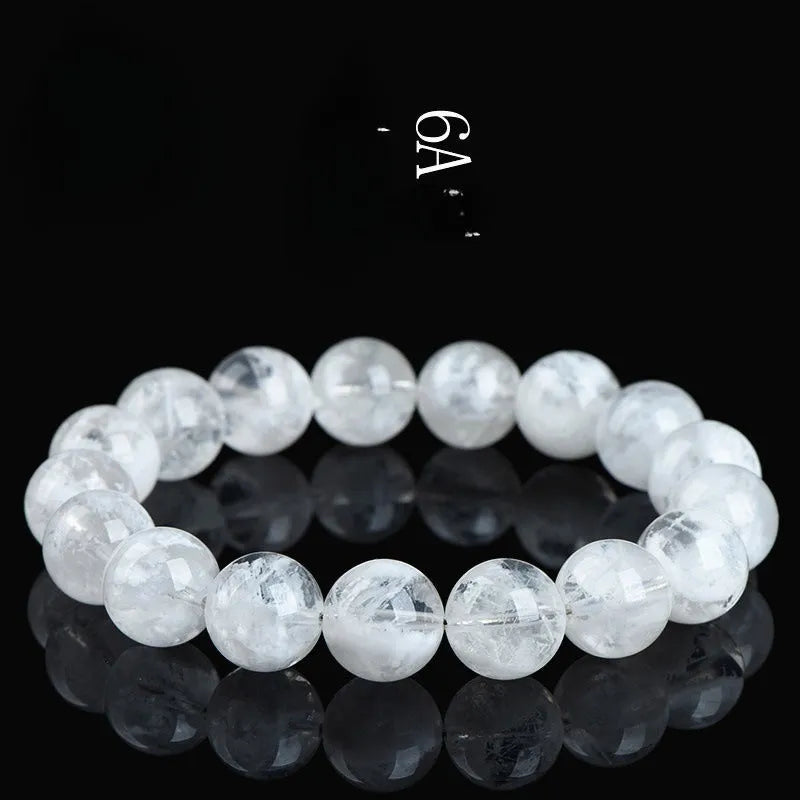 Crystal women's bracelet with natural blizzard snowflake round beads in geometric design featuring Ruyi and Xiangyun elements