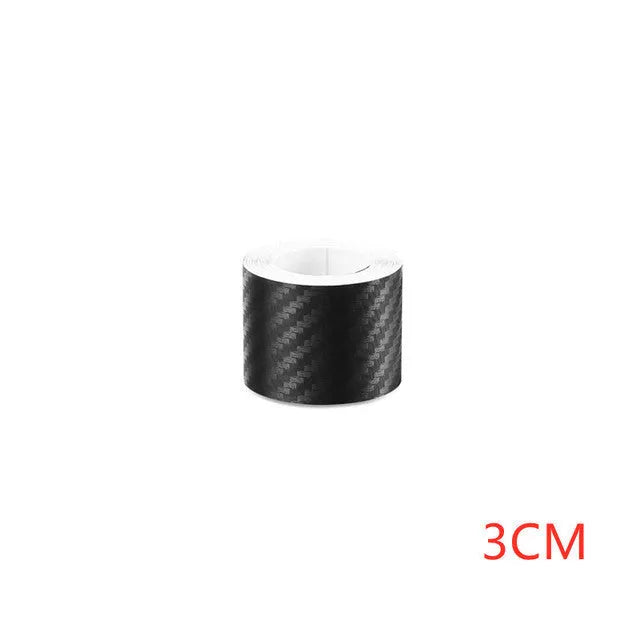 Matte carbon fibre roll bumper sticker for car door sill protection in various widths.