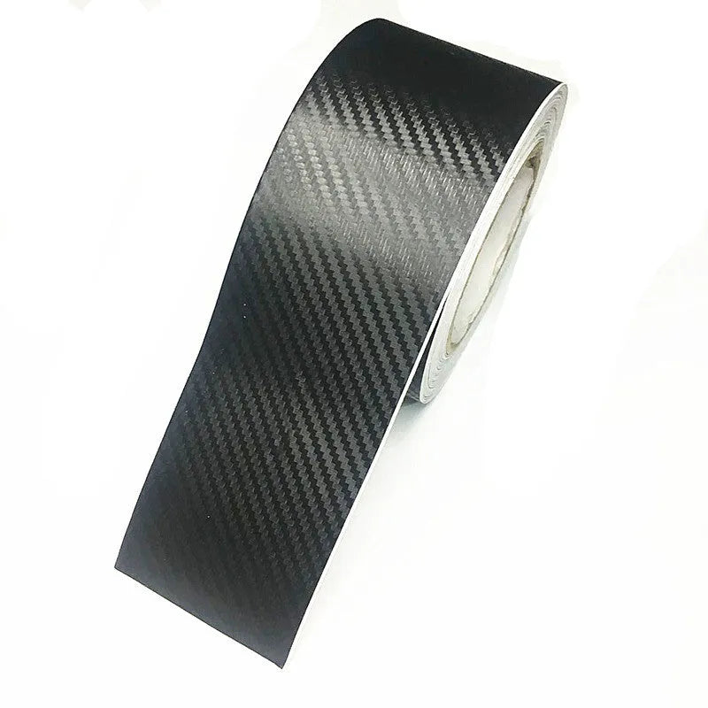 Matte carbon fibre roll bumper sticker for car door sill protection in various widths.