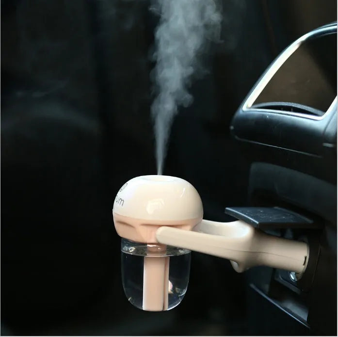Portable car humidifier and air freshener diffuser with adjustable nozzle for vehicle use