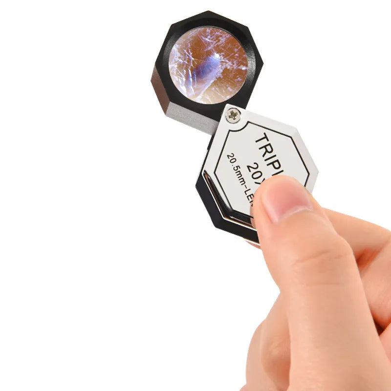 Handheld portable jewelry magnifying glass with metal frame and optical glass lens