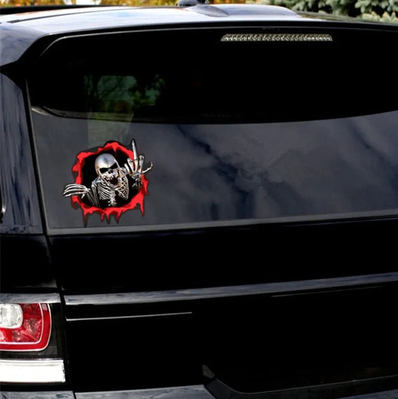 Reflective metal skull car bumper sticker with colourful broken shell design measuring 15 by 14 centimetres