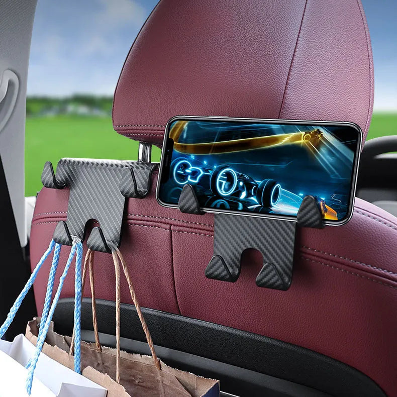 Black ABS car multifunction hook with carbon fibre pattern and integrated phone bracket for rear seat storage.