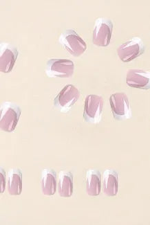 24 white fake nails with plaid patterns arranged as nail tips