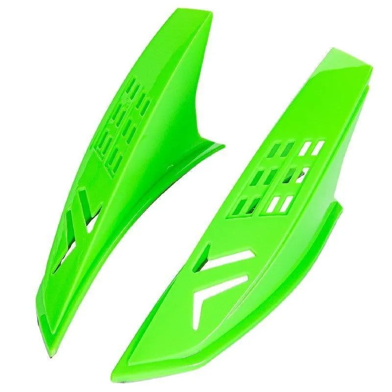 A pair of coloured helmet horns for child's motorcycle or ski helmet modification.
