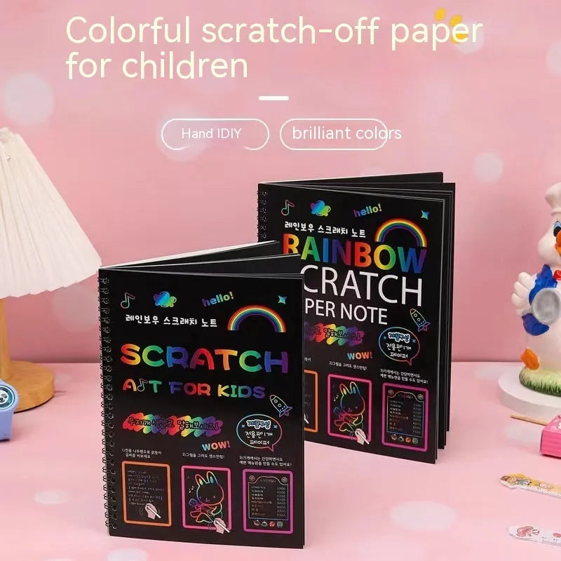 Children's large scratch art paper with colourful revealed designs from scraping activity