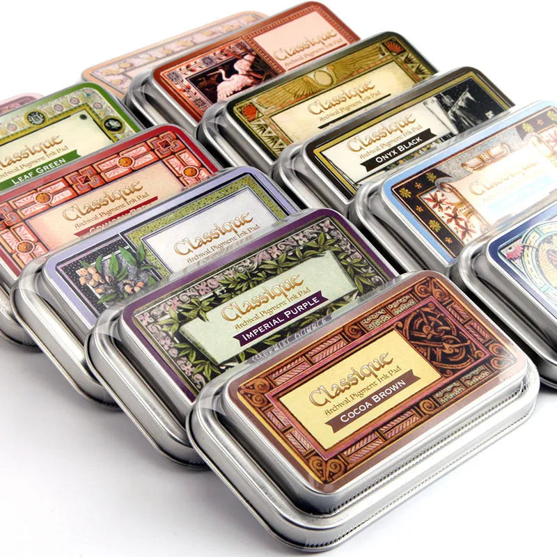 Rectangular stamp pad with oily ink in cocoa brown, fog blue, gray pink, green, and leaf green options