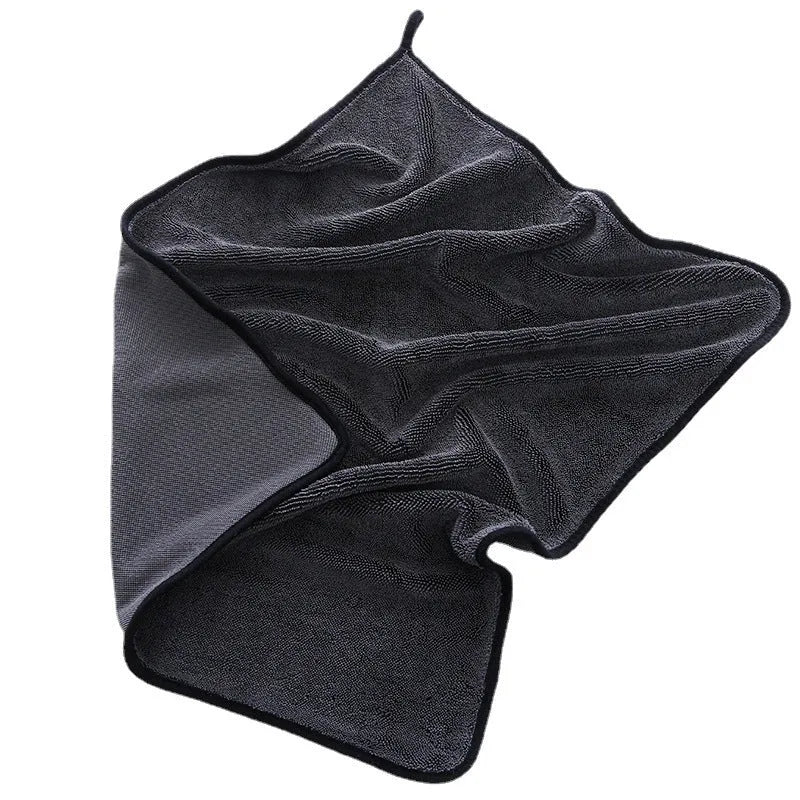 Grey car cleaning cloth with black hemmed edge shown in various sizes for vehicle and pet care.
