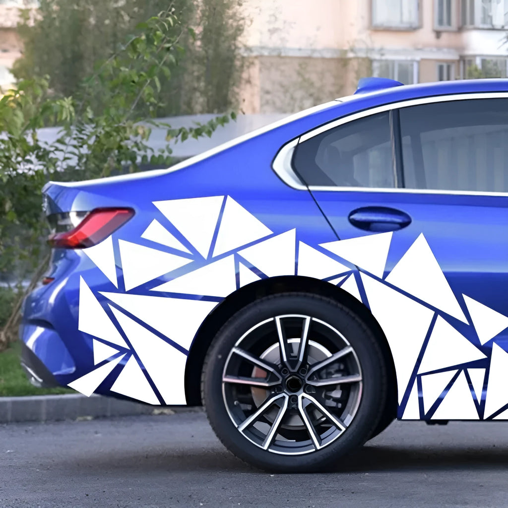 Large black geometric vinyl car sticker sheet for wheel arch decoration, measuring 200cm by 60cm.