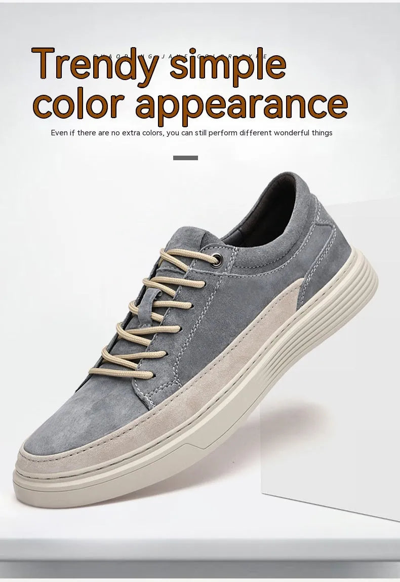 Men's grey low-top casual skate shoes with pigskin upper and rubber sole, shown from the side.